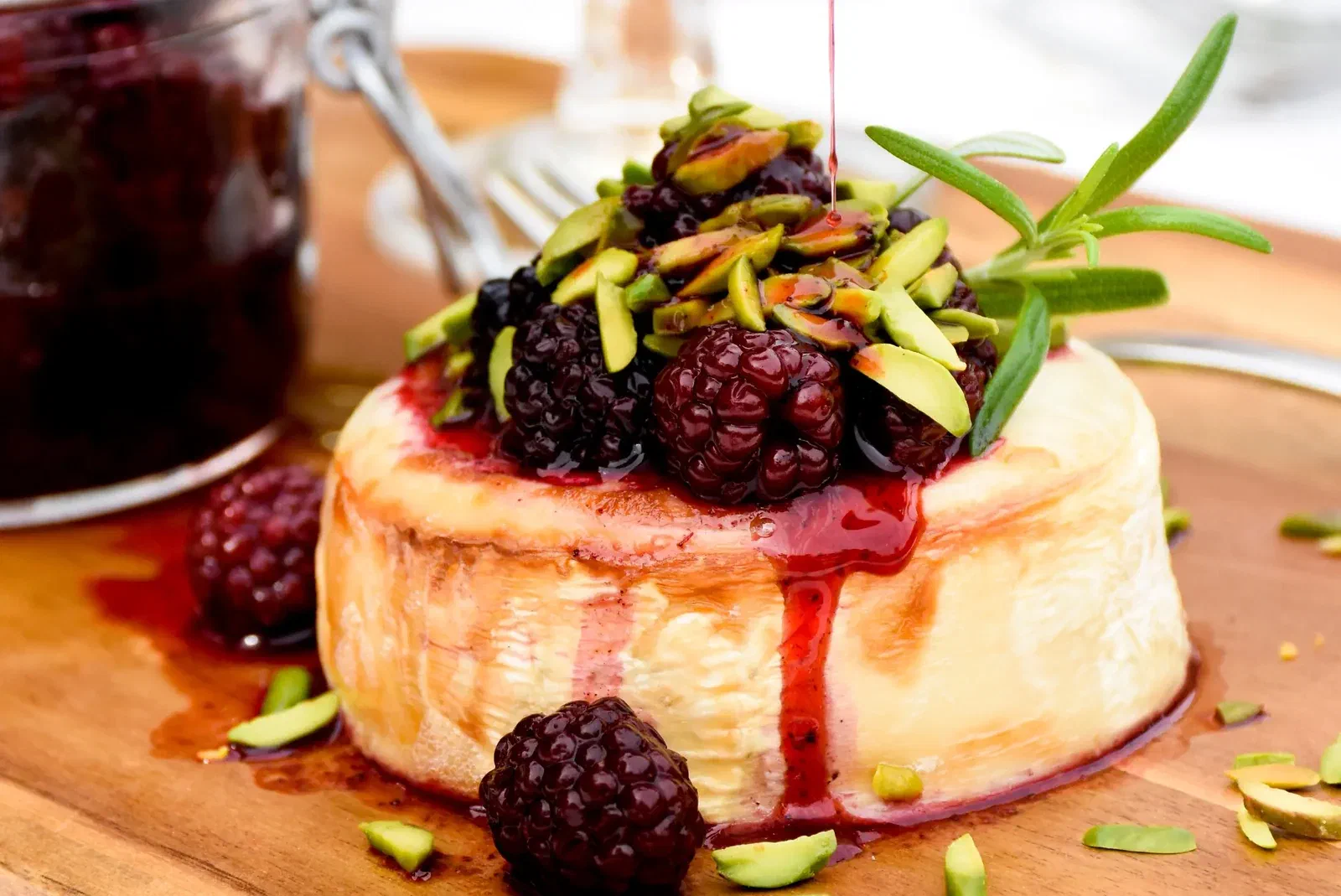 Baked Goat Cheese with Blackberries and Pistachios