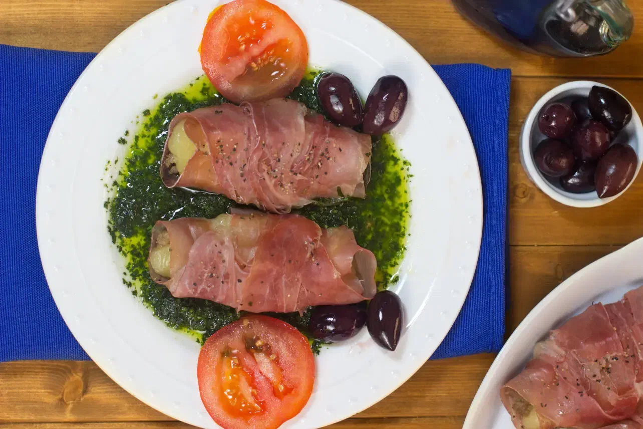Prosciutto-Wrapped Mozzarella Bites with Herb Oil