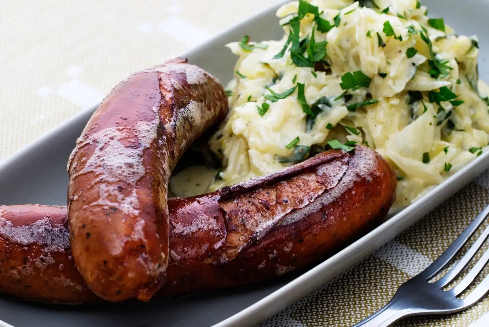 Pan-Fried Sausages with Creamed Green Cabbage